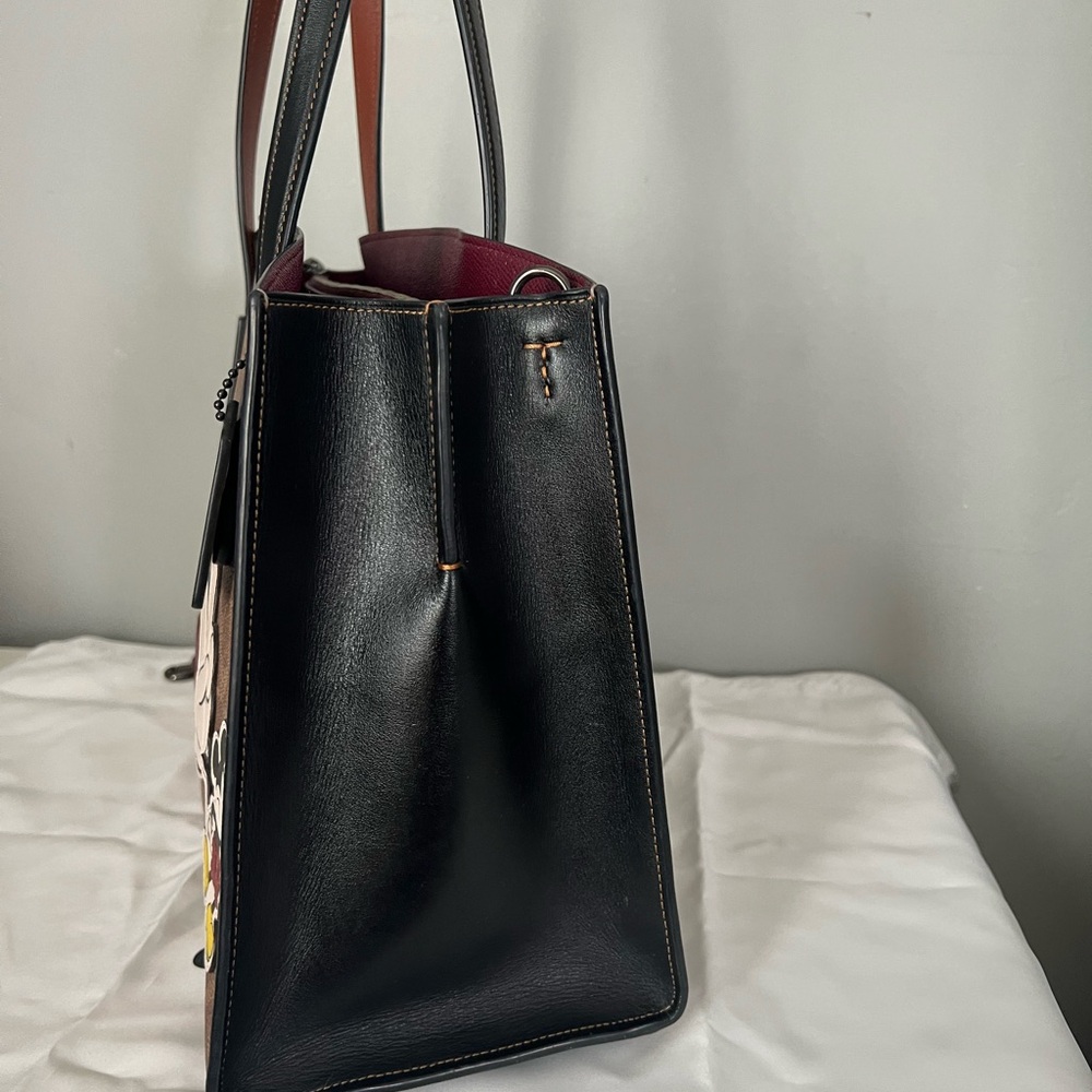 Disney X Coach Charlie Carryall
In Signature Canvas With Patches - Picture 8 of 15